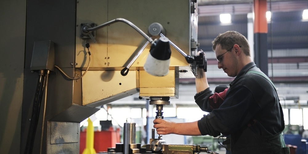 engineering people manufacturing industry with big modern computer machines-412635-edited.jpeg